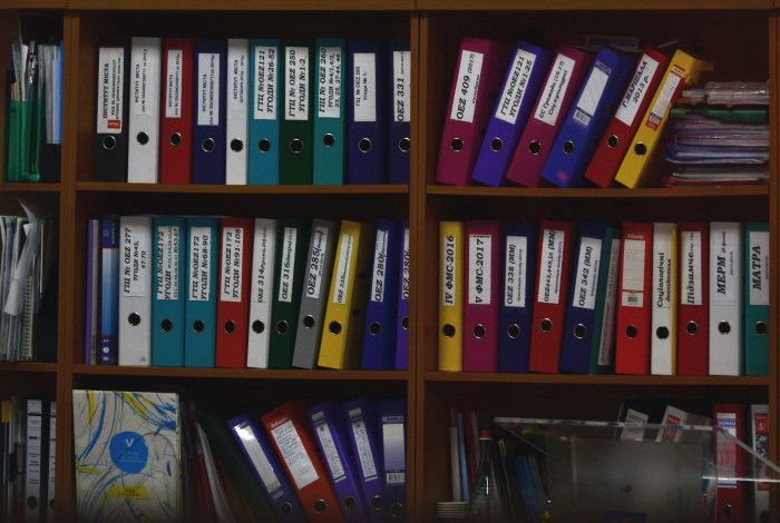 shelving with coloured binders